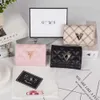 El çantası tasarımcısı% 50 indirim sıcak marka kadın çantası yeni basit elmas desen kısa cüzdan düz renk sıfır belge çanta para