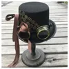 Basker mode kvinnor handgjorda steampunk topphatt med växelglasögon och band scen magisk cosplay storlek 57 cm