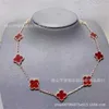 Brand de créateur Four Leaf Grass Ten Collier de fleurs Glod Natural Fritillaria Red Chalcedony laser Femelle 18K Boucles d'oreilles en diamant complet Bracelet