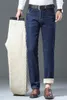 Męskie dżinsy zimowe wełna aksamitna polar pogrubiony prosty biznesowy biznes swobodny komfortowe spodnie dżinsowe