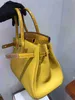 Bikn da borsetto da 7A designer Bikn in pelle vera pelle coccodrillo coccodrillo combinato con pacco da 30 pacchetti da donna portatile da donna portatile luce ambra di lusso giallo giallo giallo