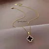 Four Leaf Clover Black and White Dual Color Full Diamond Necklace for Women in 2024, New Trendy and Fashionable Collarbone Chain Titanium Steel Necklace 779