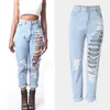 Kvinnors jeans hål denim byxor kvinnor mode avslappnad rak hög midja byxor rippade femme punk stil bomullsgata