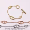 Europa en de Verenigde Staten verkopen sieraden koper Goldplated Smooth Pig Nose Day Ot Buckle Bracelet in drie kleuren