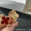 High-End-Schmuckringe für Vancleff Womens New Laser Red Chalcedony Clover/Fliped Ring 18k Doppelblum