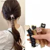 Haarrubberbanden Y2K Hartontwerp Ponytail Elastische haarbanden Rubber haarbanden Bundel Scrunchies Telefoon Draad Haaraccessoires Dames Hoofdband Y240417X6TD