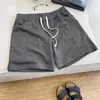 Shorts masculinos Cintura ajustável Carga vintage com vários bolsos para homens solteiros de verão esportivo de verão