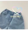 Summer Kids Girls Shorts coréens Style Patchwork Lace Denim Shorts décontractés et vaies élastiques Ruffles Pantalons Girl Jeans courts 240418