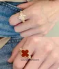 Bijoux haut de gamme Anneaux pour Vancleff Womens Time Glans Clover Ring Femelle Double Fleur Pure argent rotatif laser Natural Red Chalcedony Ring Sentiment Original 1: 1