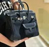 Frauen luxuriöse Handtasche L 2024 Neue Leinwand Ladung Taschenbeutel Cowide farbig modische Luxushandheld One Schulter Frauenbeutel