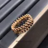 High End Designer smycken ringar för kvinnors carter V-guld CNC Rivet Bullet Head Rotatable Ring V-Gold Liuding Par Nail Ring Original 1: 1 med riktig logotyp