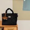 Tassen grote capaciteit Tote Tas Mama Bag Baby Stroller Hanging Bag Nappy Tassen Multifunctionele opslag Handtas voor Mom Damestas Nieuw