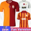 23 24 Maglie da calcio di Galatasaray Mens Michael Seri Falcao Belhanda Luyindama Mostaga Diagne Lemina Feghouli a casa 3a camicie da calcio