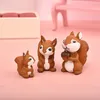 장식 인형 4pcs/set lovely squirrel 가족 모델 만화 동물 입상 집 케이크 홈 장식 아이 미니어처 정원 장식