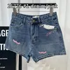 Pantalones de mezclilla de jeans para mujeres Button de pantalones casuales de verano Tassel Jean High Winist Slim Sexy Shorts XB972153