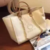 Marka klasyczne designerskie torby plażowe płótno Pearl Even Evening Bag luksusowe zakupy przenośne duże zdolności torebki torebki etykieta plecak plecak plecak satchel h08020