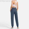 Desginer Alooo Yoga Pant Leggings Pocket Fitness Womens Loose Strap Quick Dry High midje Casusports Pants Pants