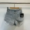 2024 Street Spicy Girl Metal Diamond Pocket exposé 3/4 short en jean pour femmes