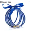 Bracelet de mode bleu foncé arc brillant bracelets de gelée de silicone remplie de silicone bracelets 5pcs / set cadeau de la journée pour enfants