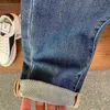 Męski projektant dżinsów zupełnie nowe wysokiej klasy haftowane dżinsy, sezonowe szczupłe dopasowanie małe proste lampę elastyczne wszechstronne spodni L81D