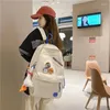 Ryggsäck enkelhet kvinnor ryggsäckar stor kapacitet tonårsflicka student skolväska söt anka pendent kvinnlig modebokväska