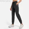 Desginer Alooo Yoga Pant Leggings Pocket Fitness Womens Loose Strap Quick Dry High midje Casusports Pants Pants