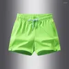 Shorts masculinos lazer esportes de verão esportes de bolso sólido Casa solta Micro elástico casal da moda Fitness Beach