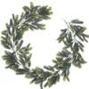 装飾的な花人工クリスマスパイン針は緑と黄色の花輪の装飾緑の花輪ヴァインラタン階段クリスマス