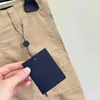 Shorts Designer maschile L Famiglia 24SS Taschi di lavoro per lettere primavera/estate per pantaloni per il tempo libero da uomo e donna con cotone tecnologico 1ah9