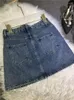 Kjolar rhinestone hög midja bantning glänsande blå mitten av hög 2024 sommar culottes pocket street denim kjol