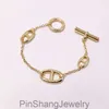 Europa en de Verenigde Staten verkopen sieraden koper Goldplated Smooth Pig Nose Day Ot Buckle Bracelet in drie kleuren7244108