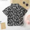 T-shirts 2024 Nouveaux enfants Style de vacances d'été en dentelle Top 3-14 Bouton de chemise à manches courtes Dernier design Q240419