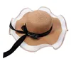 Cappelli larghi da donna Pagnello estivo floppy per cappello da sole Mesh patchwork Wavy Ribbon Bowknot Elegante Crema solare Beach Strata Stra