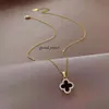 Four Leaf Clover Black and White Dual Color Full Diamond Necklace for Women in 2024, New Trendy and Fashionable Collarbone Chain Titanium Steel Necklace 185