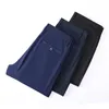 Pantaloni cortosi da uomo allungare il solido set di asciugatura per ufficio casual nero smart cimopere estate gamba dritta coreana