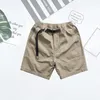 Mäns shorts avslappnad knä längd snabbtorkande sommar gym kroppsbyggande lös bred ben dagliga kläder