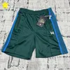 Shorts maschile 2024 Agi sciolti in stile estivo AGGGIA AGGI SUGGERIONI DONNE 1: 1 Stripes di tasca con cerniera di qualità calzoni