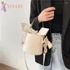 Schoudertassen Xinlei zomerstijl eenvoudige high-end western trend mode all-match one-shoulder messenger bucket Bag vrouw XB328