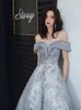 Runway Dresses Shiny Blue Bridesmaid Dress Båt Neck Gilding Applices Sequin Beading A-Line Wedding Banket Celebrity Prom Evening Gowns