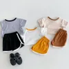 Zestawy odzieży letnie ubrania dla dzieci 2024 Koreańska seria chłopcy i dziewczęta bawełniane swobodne koszulki z kreskówek szorty