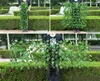 Dekorative Blumen Künstlicher Garten Retractable Zaun erweiterbarer faux grüner Blatt Bildschirme Rattan Outdoor Heckreben Kletterrahmen