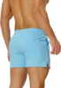 Short masculin mens entraînement transpiration de 3 pouces de coton décontracté fitness coulant avec des poches