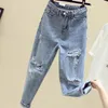 Kvinnors jeans trendiga sommarkvinnor tvättade lösa denim byxor rak ankel längd kvinnlig tofs hål höga midja byxor