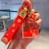 New product full of blessings, with auspicious characters in oil, flowing sand, drifting bottles, keychains, creative and festive New Year keychains, wholesale