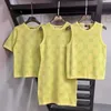 Tricot de tricots pour femmes Designer 2024 printemps / été nouveau jaune rond coule de coule de nouflé débarquant