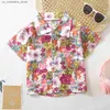 T-shirts 2024 Nouveaux enfants Style de vacances d'été en dentelle Top 3-14 Bouton de chemise à manches courtes Dernier design Q240419