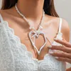 Chaines Collier de démarrage des adolescents élégant pendant coeur perle avec décoration d'arc longueur en acier inoxydable réglable pour la fête