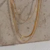Tarnish en acier inoxydable libre 18 carats Gold plaqué Herryingbone Collier de couche de chaîne de serpent mince Collier de chaîne en or sexy 240418