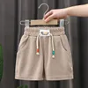 Shorts Summer Boys Candy Color Beach Shorts per bambini Bambini elastici casual pantaloni corti Sport abbigliamento outwear 240418