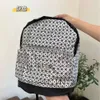 Nueva mochila de silicona original japonesa con gran capacidad Bloqueo de color del estudiante Unisex simple para viajar